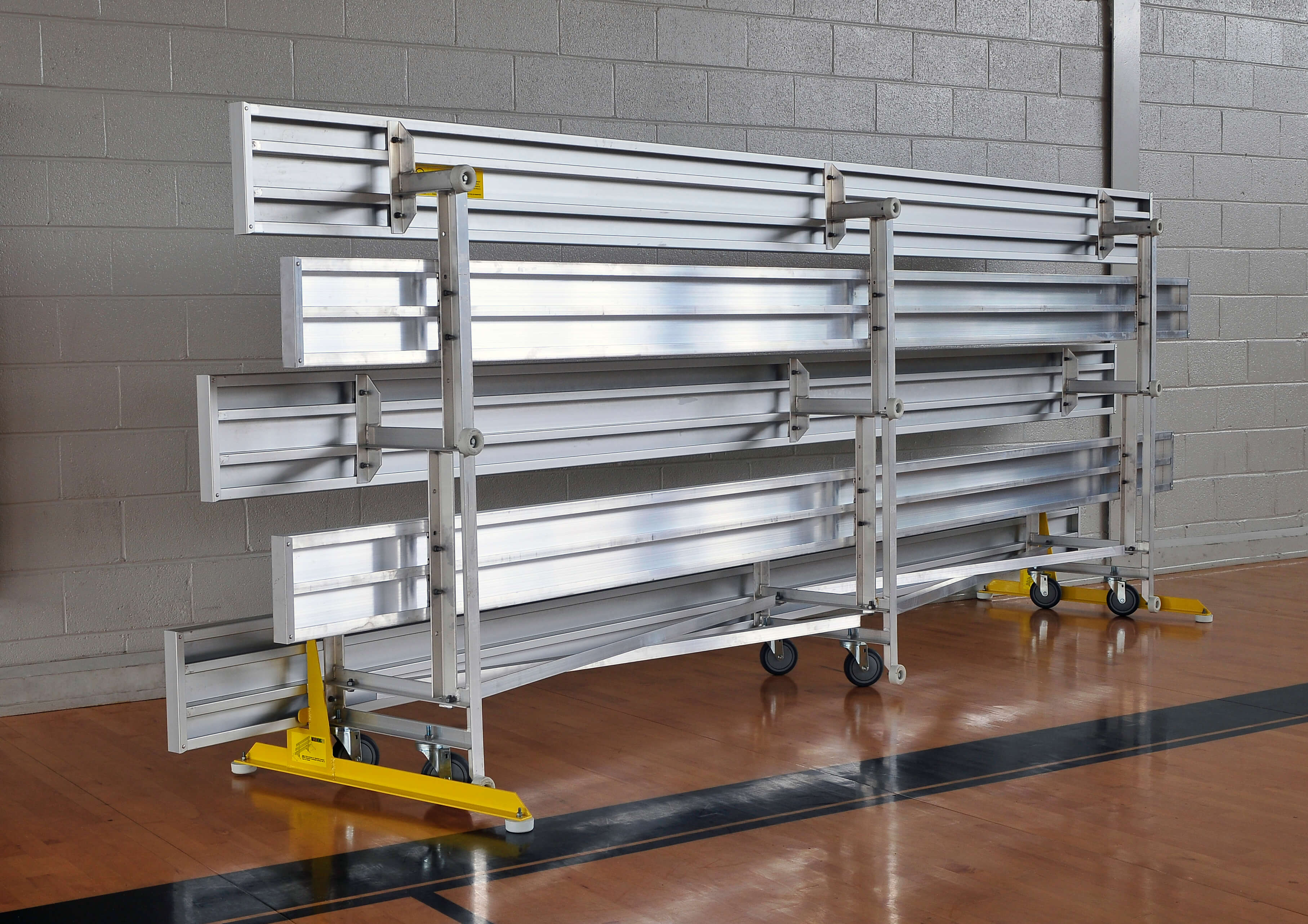 DLWTR039 • 3 Row Tip N Roll Bleacher • Seats 18